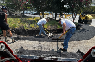 Pave Pro's crew spreading asphalt.
