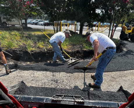 Pave Pro's crew spreading asphalt.